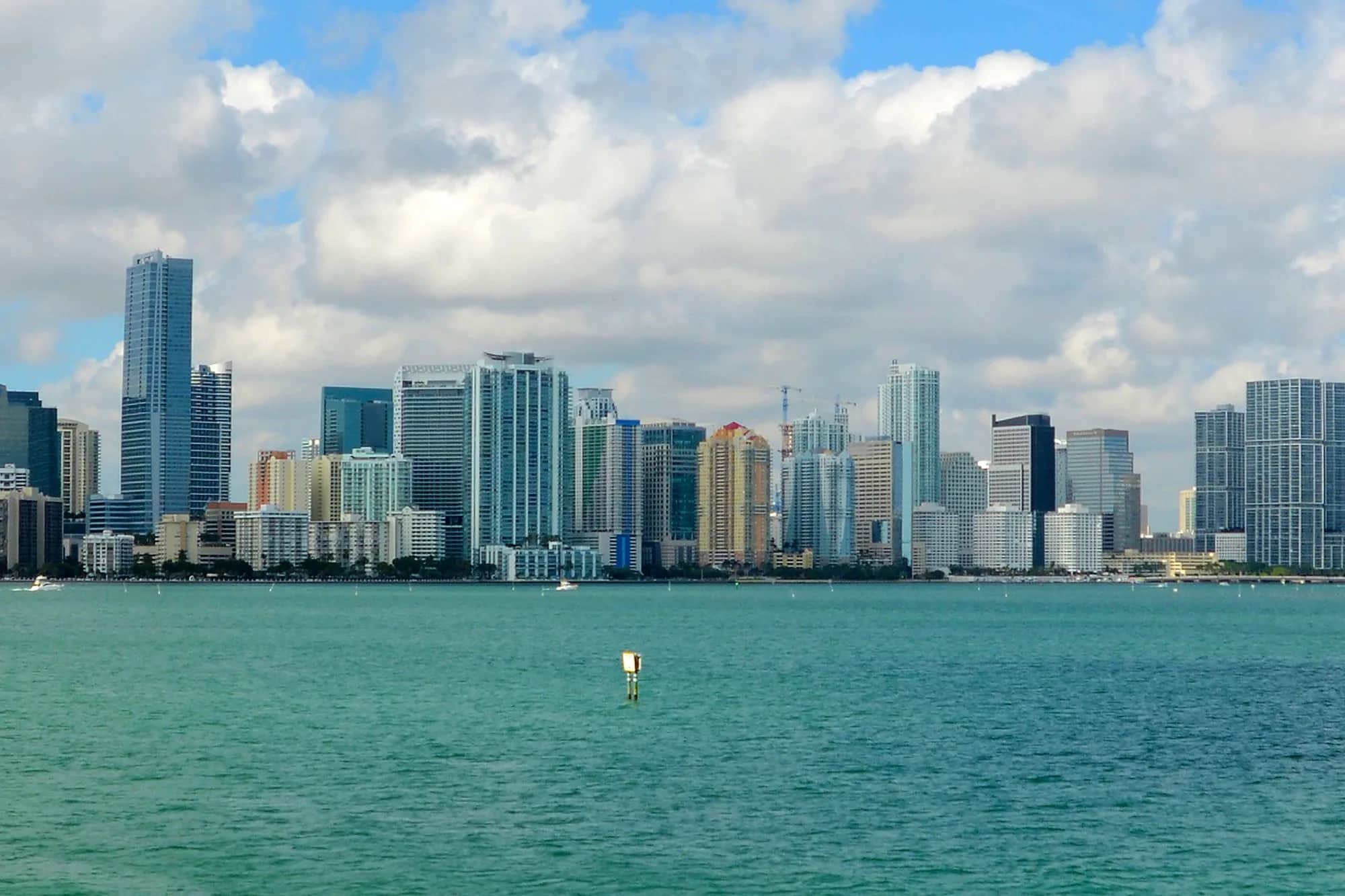 The Miami skyline and turquoise water of Biscayne Bay