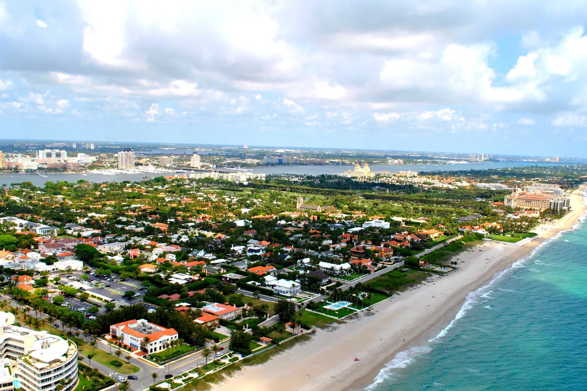 Aerial view of Palm Beach, Florida, showing oceanfront estates, beaches, and the Intracoastal Waterway