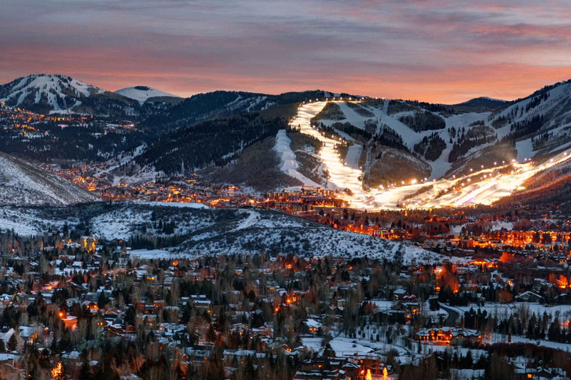 Aerial overview of Park City, Utah, with mountain ski terrain surrounding the town