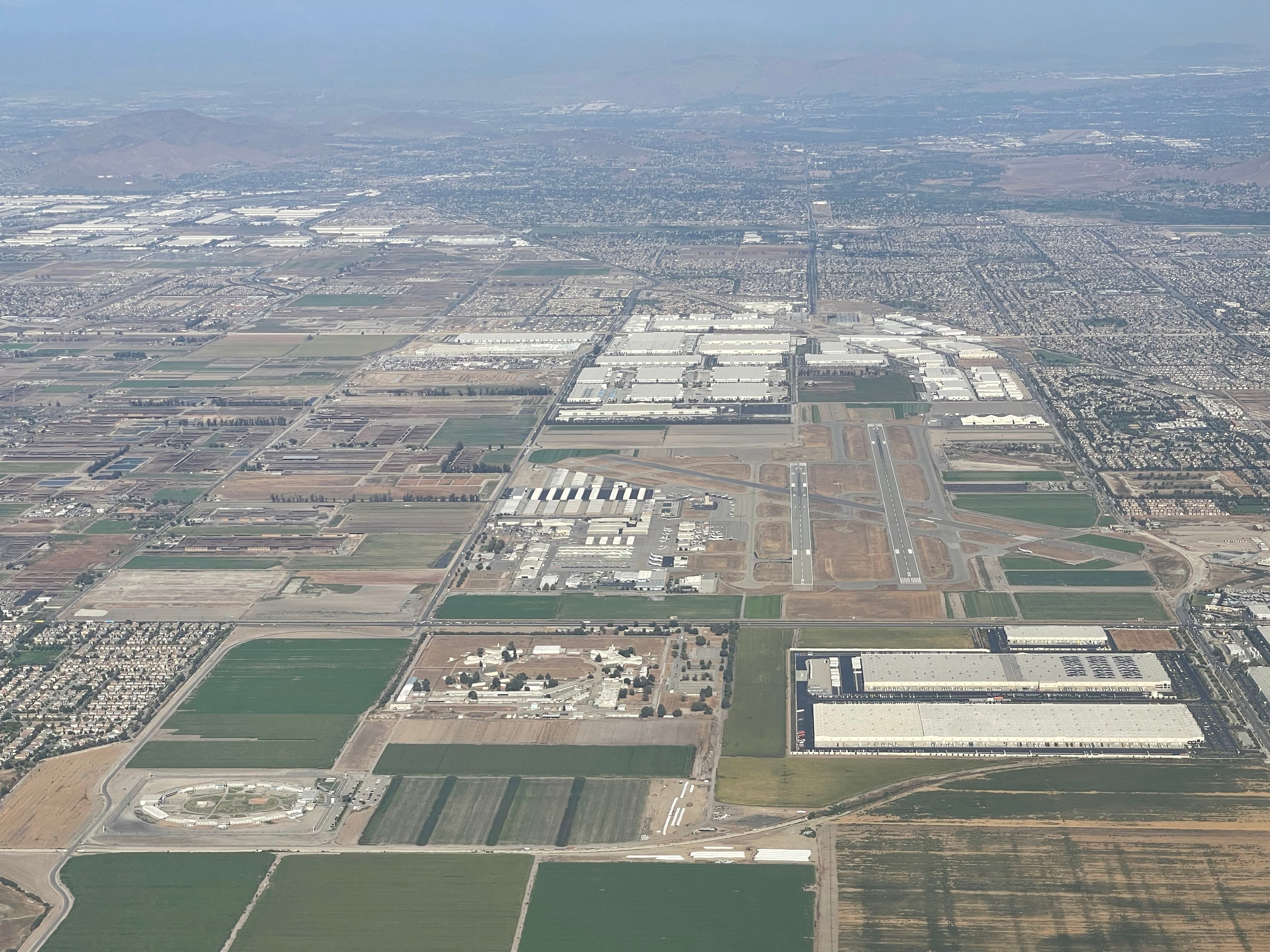Aerial view of Chino Airport and its three-runway layout in San Bernardino County, California