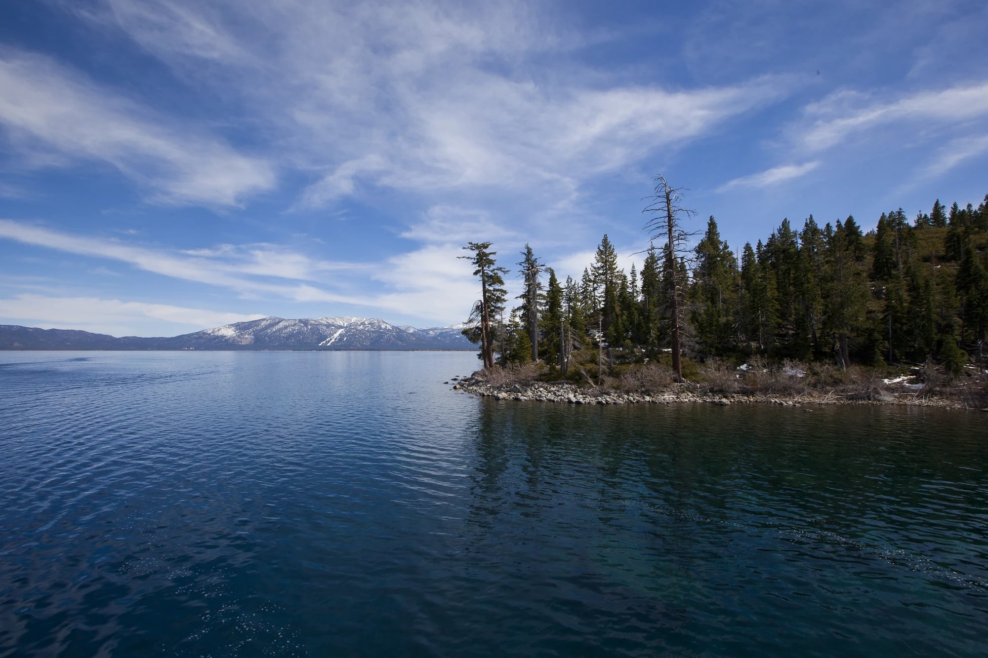 Lake Tahoe's North Shore viewed across the deep blue water from the East Shore
