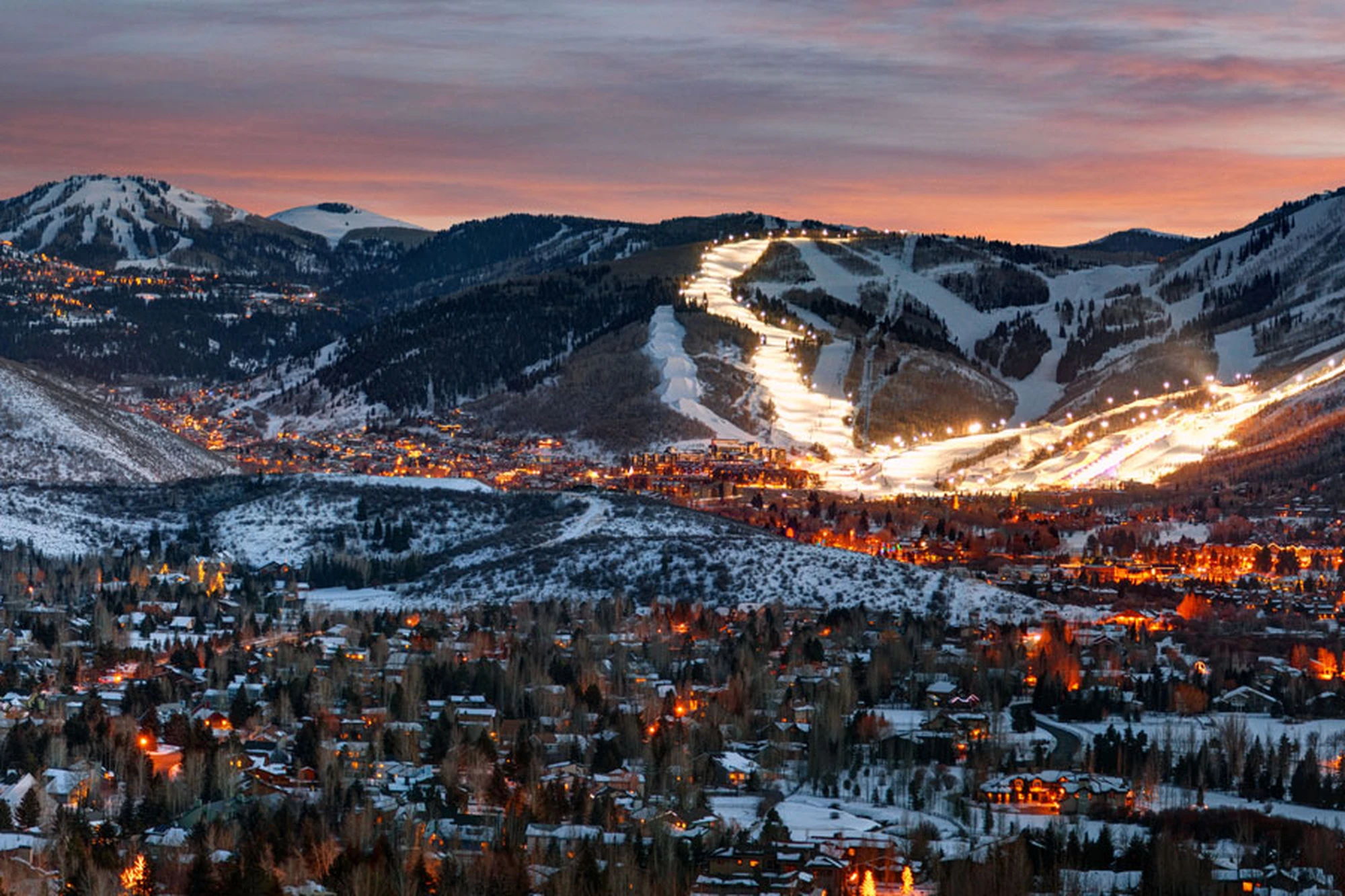 Aerial overview of Park City, Utah, with mountain ski terrain surrounding the town