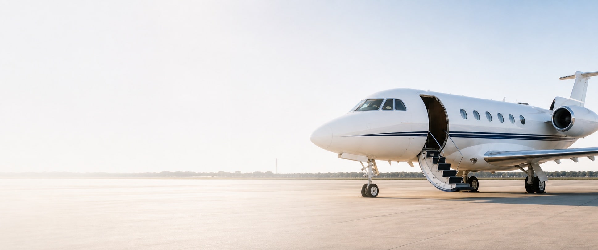 Private jet ready for departure on a sunlit airport apron